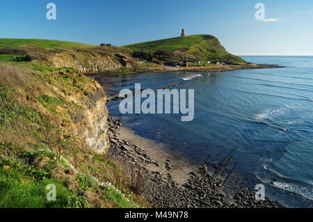 UK,Dorset,Kimmeridge Bay with Clavell Tower in background Stock Photo