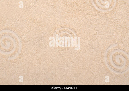 Yellow towel texture or background with spiral pattern Stock Photo