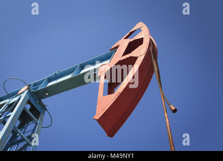 Work of oil pump jack on a oil field Stock Photo