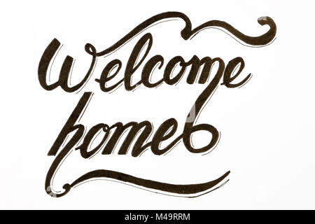 Welcome Home - calligraphy lettering in black and white Stock Photo