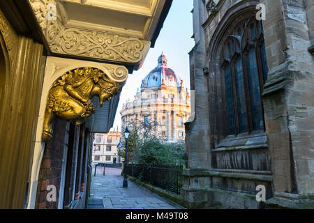 Faun Carvings above the aslan door into Brasenose College in St Mary's Passage in the early morning. Oxford, Oxfordshire, England Stock Photo