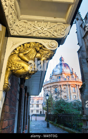 Faun Carvings above the aslan door into Brasenose College in St Mary's Passage in the early morning. Oxford, Oxfordshire, England Stock Photo