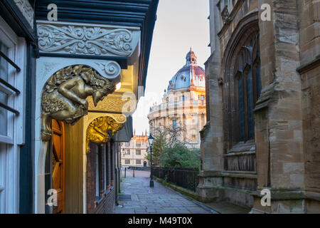 Faun Carvings above the aslan door into Brasenose College in St Mary's Passage in the early morning. Oxford, Oxfordshire, England Stock Photo