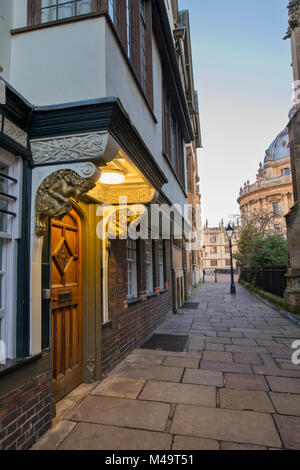 Faun Carvings above the aslan door into Brasenose College in St Mary's Passage in the early morning. Oxford, Oxfordshire, England Stock Photo