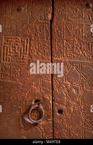 symbols of zoroastrist engraved on doors in the Iranian city of Abjyan Stock Photo