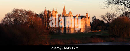 Sunset over the lake at Burghley House, Elizabethan Stately Home, Cambridgeshire England, UK Stock Photo