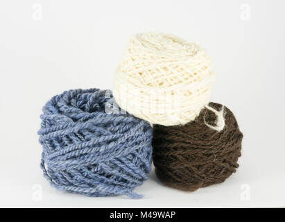 Balls of wool on a white background Stock Photo