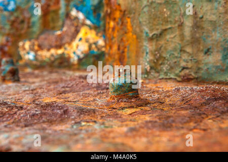 Detail of a rusted metal surface with bolt and nut Stock Photo