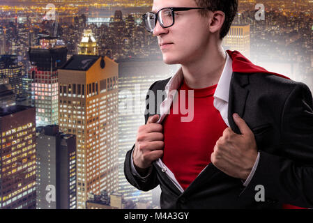 Man with red cover in super hero concept Stock Photo