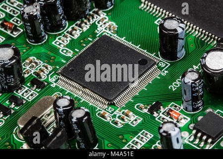 Electronic circuit board with chip and radio components Stock Photo