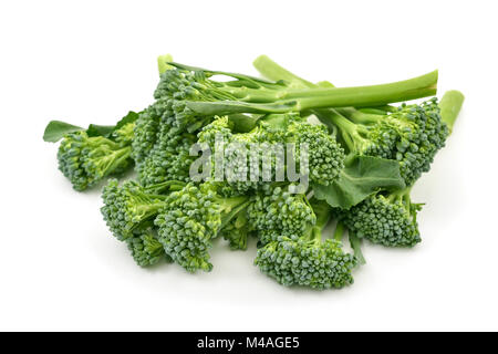 closeup of some stems of broccolini on a white background Stock Photo