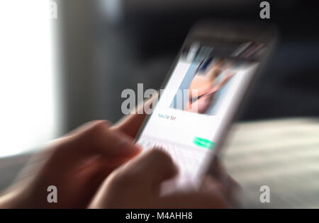 Body shame, cyber bullying and bad behavior online concept. Internet troll writing mean comment to picture on an imaginary social media website. Stock Photo