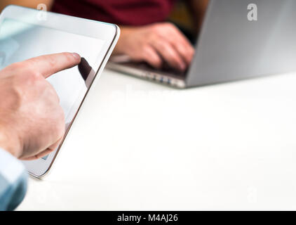 Business people working together in modern office and having meeting. Negative empty blank copy space for content. Sharing ideas, teamwork. Stock Photo
