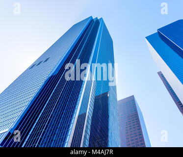 Tall office buildings view from down on the ground. High skyscrapers in a city. Stock Photo