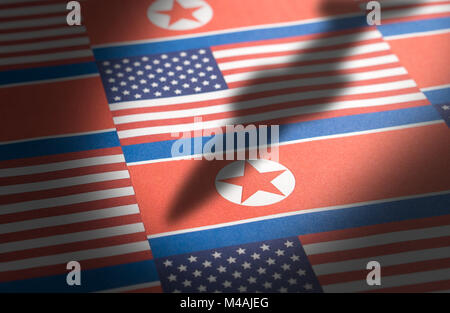 The flag of North Korea and United States of America (USA) with a shadow from a ballistic missile. Stock Photo