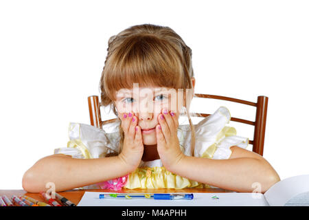 thoughtful girl with pencils and album on a white background Stock Photo