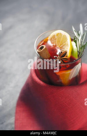 Mulled wine with different spices in the red cloth Stock Photo