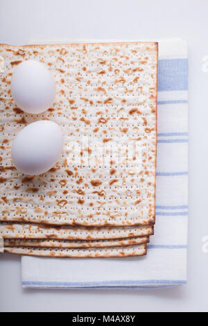 Matza and eggs for Jewish celebration passover Stock Photo