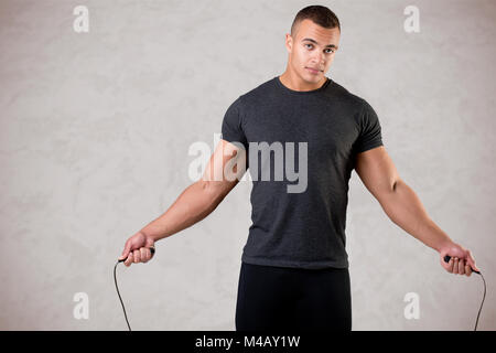 Sporty Man With Jumping Rope Stock Photo