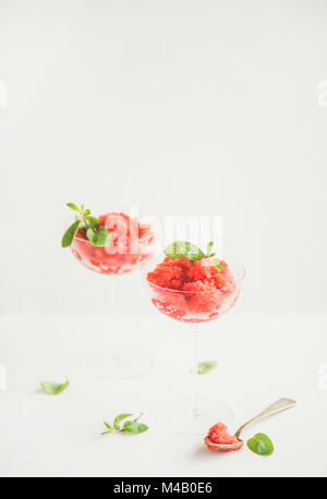 Strawberry and champaigne summer granita with mint in champagne glasses Stock Photo