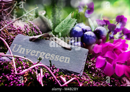 Grave decoration in autumn with slate Stock Photo