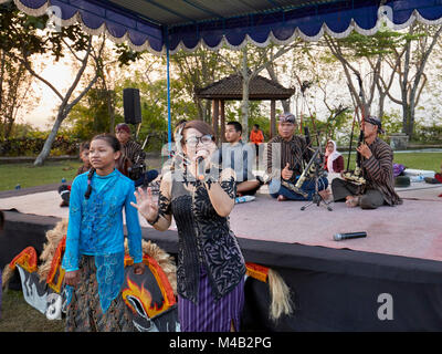 Indonesian musicians playing traditional music for visitors of Ratu Boko Palace compound. Special Region of Yogyakarta, Java, Indonesia. Stock Photo