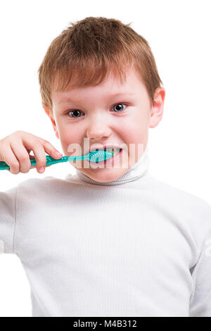 Boy without baby teeth with toothbrush Stock Photo