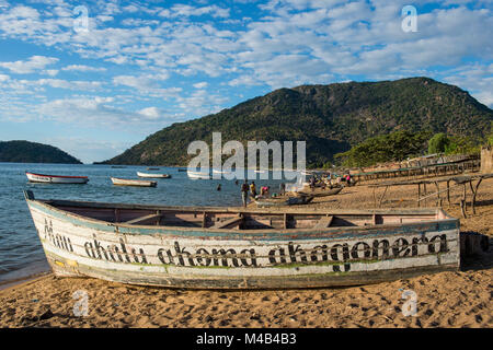 A boat on a beach at Cape Maclear on the shores of Lake Malawi, Malawi ...