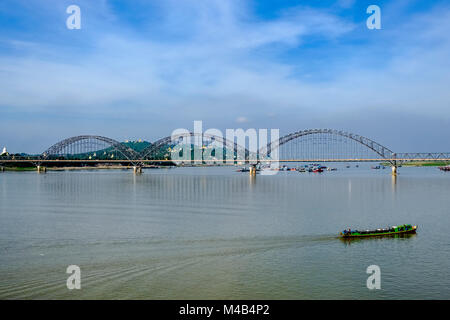 The Yadanabon Bridge is crossing the Irrawaddy river Stock Photo