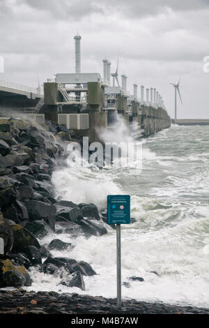 High waves at the storm flood barrier, Oosterscheldekering at Neeltje Jans, Zeeland, The Netherlands Stock Photo