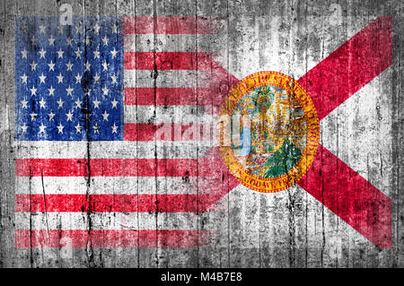 USA and Florida flag on concrete wall Stock Photo