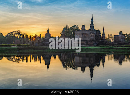 sunrise at Sukothai Historical Park - Thailand Stock Photo