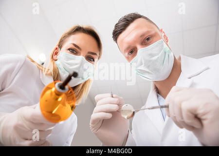First Person View Of Male And Female Dentist In A Clinic Stock Photo