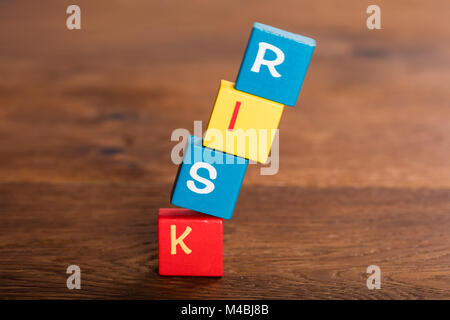 Risk management concept with cubes stack Stock Photo - Alamy