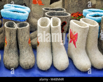 Warm shoes for children made of felt (boots) Stock Photo