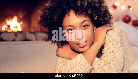 Close up of pretty black woman in sweater Stock Photo