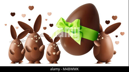 Chocolate Easter bunnies with egg and green ribbon bow isolated on white background Stock Photo