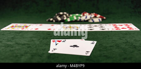 On the green baize poker is the distribution of cards Stock Photo