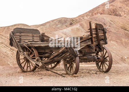 Old wooden broken wagon in calico ghost town Stock Photo