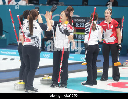 15th Feb, 2018. S. Korea-Canada women's curling South Korean curlers celebrate after beating Canada 8-6 in the women's team event preliminary at Gangneung Curling Centre in the Games' sub-host city of Gangneung, east of Seoul, on Feb. 15, 2018. Credit: Yonhap/Newcom/Alamy Live News