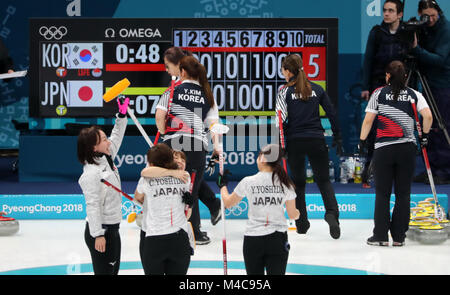 15th Feb, 2018. S. Korea-Japan women's curling Japanese curlers rejoice after beating South Korea 7-5 in the women's curling preliminary at Gangneung Curling Centre in the Games' sub-host city of Gangneung, east of Seoul, on Feb. 15, 2018. Credit: Yonhap/Newcom/Alamy Live News