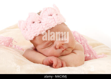 Newborn baby girl sleeping in nursery, beautiful new baby relaxed and sleeping Stock Photo