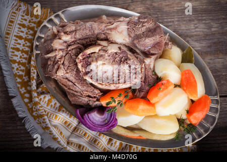 Pot-Au-Feu - French beef stew with a carrot and potatoes. Stock Photo