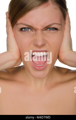 Emotional woman covers her ears with her hands Stock Photo