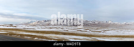 a panoramic view snow mountains on tibet plateau Stock Photo