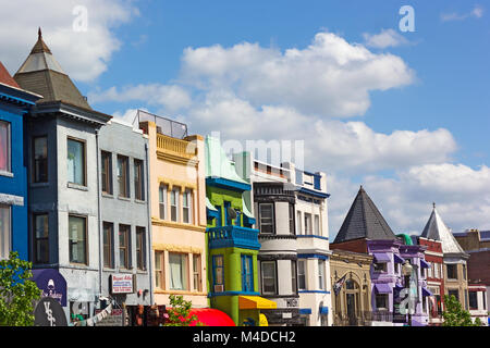 WASHINGTON DC, USA – MAY 9, 2015: Vibrant buildings colors of shops and eateries in Adams Morgan neighborhood on a sunny spring day on the street of t Stock Photo