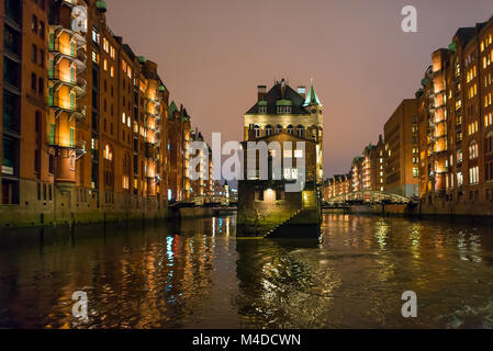 Water castle in the historic district Speicherstadt Stock Photo