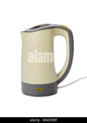 White electric kettle stands on a gray table plugged into a power outlet  Stock Photo - Alamy