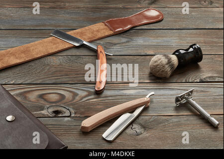 Vintage barber shop tools on wooden background Stock Photo