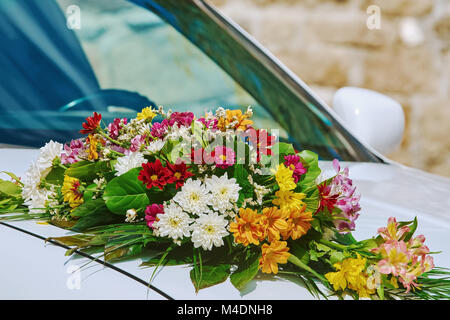 Bouquet on the Car Bonnet Stock Photo